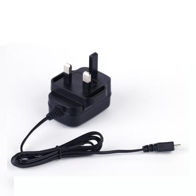 China Fireproof PC Wall Plug In AC Power Supply Output 9v 0.5a 1a AC DC Power Adapter for sale