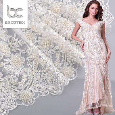 China 2021 Anti-Static Heavy White Hand Beaded Bridal Lace Fabric Dubai for sale