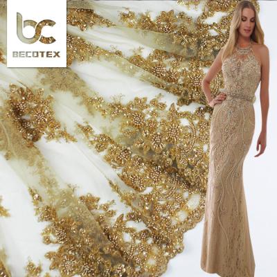 China 2021 Handmade Pearl Gold Lace Fabric High Quality Bridal Beaded Lace Fabric Beaded Lace Fabric for sale