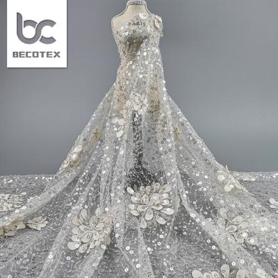 China 3d applique 2021 high quality 3d bridal lace fabric pearl white lace fabric pearl beaded lace fabric for sale