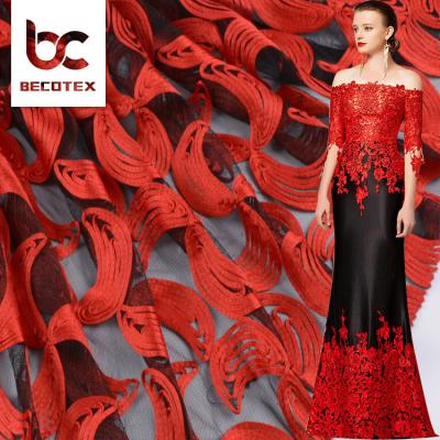 China Sustainable Newest Designs African Water Soluble Embroidered Red Guipure Cord Tulle Lace Fabrics for sale