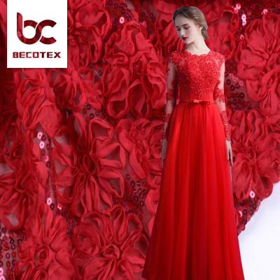 China Viable High Quality Polyester 3D Floral Red Guipure Rope Embroidery Sequined Lace Fabric for Clothing for sale