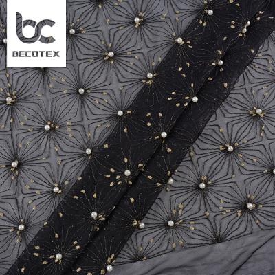 China Wholesale Useful Decorative Anti-Static Beautiful Stretch Embroidered Tulle Fabric With Bead for sale