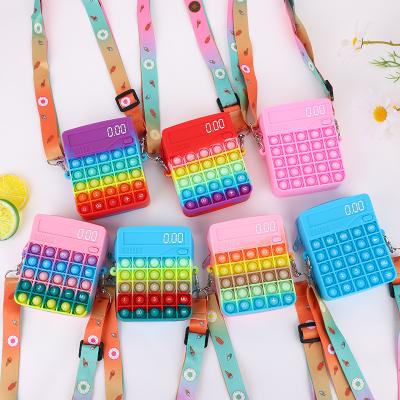 China Fashion REWIN Rainbow Push Bubble Wiggle Sensory Calculator Toys Snap Silicone Purse Cross Body Coin Purse for sale