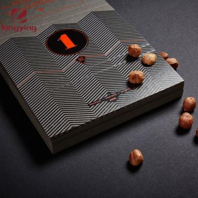 China 2021 New Arrivals Recyclable Custom Luxury Matte Black Pearl Paper Chocolate Box With Hot Stamping UV Embossing Dark Nuts Chocolate Box for sale