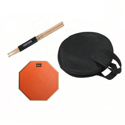 China Drums Practice 12 Inch Drum Practice Pad Double Sided With Maple Drumstick And Carry Bag For Snare Drum Practice for sale