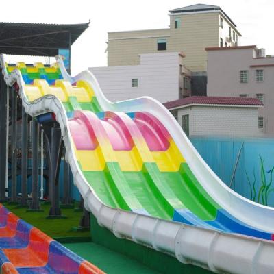 China Amusement Park Rainbow Water Slide Fiberglass Pool Slide 8m UV Resistant for sale