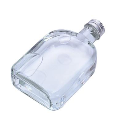 China Brandy Frosted Alcohol Spirits Drinks Vodka Bottle 350ml Clear Flat Glass Drinking Hot Wine Bottle Liquor Bottle With Lid for sale