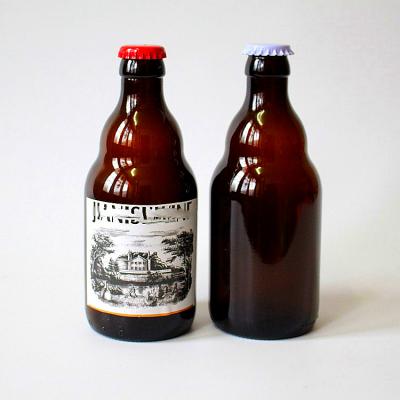 China High Quality Dark Glass Beverage Beer Bottle With Lid for sale