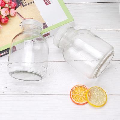 China 650ml Agriculture Lab Plant Tissue Cuture Vessels Seedling Glass Bottle With Rubber Stopper Lid for sale