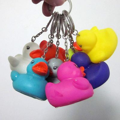 China Custom vinyl colorful duck keyring, mini colorful pvc ducks keychain with green materials shenzhen factory for sale