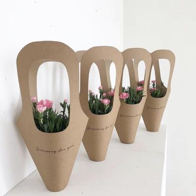 China Disposable Design Personalized Custom Logo Flower Carry Kraft Paper Flower Bag for sale