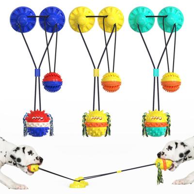 China Custom Viable Interactive Hidden Food Toys Suction Cup Cord Ball Pet Toy Teeth Cleaning Sounding Dog Molar Chew Toys for sale