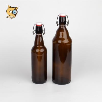 China Drink ALL IN Amber Glass Bottle 1000ml Wholesale Hot Sale Custom Beer Bottle With Easy Swing Top Cap Open End for sale