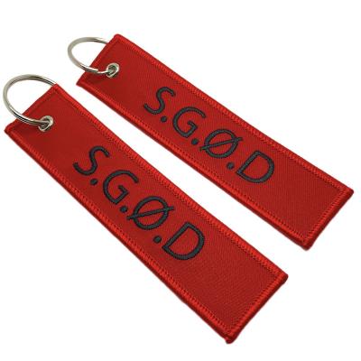 China High Quality Customized Promotion Cloth/Motorcycle/Embroidered Key Chain Remove Theft Spray Tag For Promotion for sale