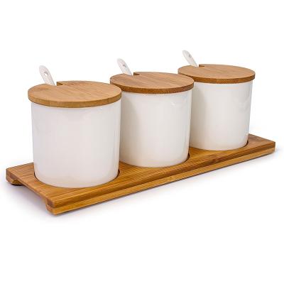 China Sustainable 3 sets of ceramic salt pepper pot with bamboo lid and ceramic spoons for sale