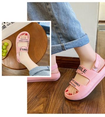 China Wholesale Price Bestselling Smile Emoji Madame Slippers Women Sandals Raincoats EVA Slipper Wink Happy Face Garden Men Cushy Sandals Unisex for sale