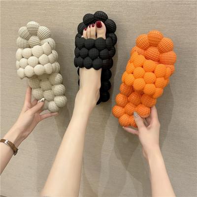 China Cool Fashion Trend Bubble Slippers Women Love Fashion Unisex Sandals Beach Home Men Massage Slips Slippers for sale