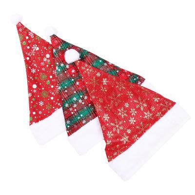 China Funny Plush Santa Hat Merry Christmas Family Party Gold Snowflake Christamas Home Decor Christmas Decoration for sale