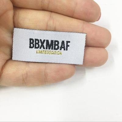 China Weaving Damask Woven Labels Customized 100PCS Machine Apparel Labels 50D Min Eco - Friendly for sale