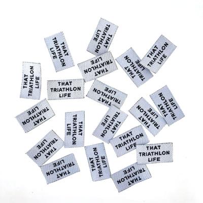 China Eco - Friendly Shirts Woven Labels Woven Label Cut And Fold Machine Fabric Woven Label for sale