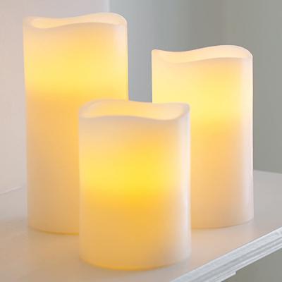 China Flameless Wavy Yellow Shape Hanko Festival Candle Flickering Outdoor Solar Led Decorative Lights for sale