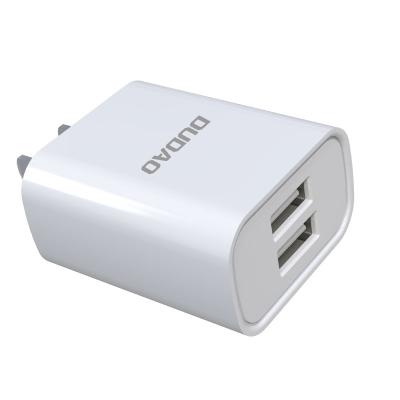 China Fire Protection Travel Charger 12W 2USB Wall Plug Fast Charging Mobile Phone Home Charger for sale