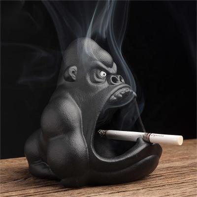 China Creative Novelty Ceramic Ashtray Porcelain Household Monkey Modern Cartoon Shaped Decor Cigar Smoking Decorative Ashtray for sale