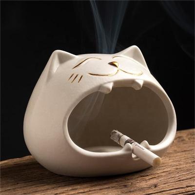 China Mono d'en forma de dibujos de creativo de cenicero de novelty decorativo moderno de porcelana para de con hogar ceramic EL ashtray for sale