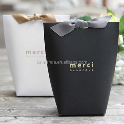 China Recyclable Eco Friendly Gold Foil Stamped Gift Bags Black White Cosmetics Small Luxury Custom Printed Paper Bag With Logo for sale