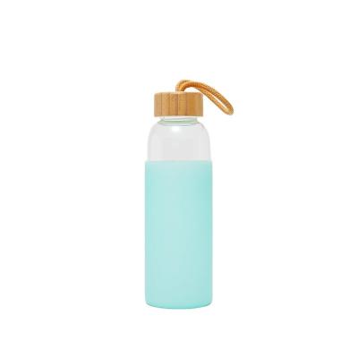 China Cosmetic high quality popular custom made glass water bottle for sale