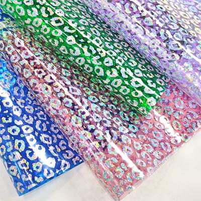 China 30x135cm Transparent Leapoard Laser Waterproof Cheetah Printed PVC See Clear Through PVC Vinyl Fabric For Bags Craft DIY Sewing Patchwork for sale