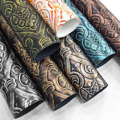 China Vintage waterproof metallic design embossed flower textured synthetic fabric for upholstery sewing crafts bags shoes making for sale