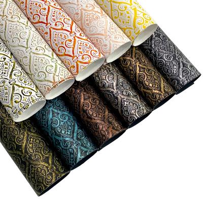 China Waterproof Embossed Flower Textured Crafts Fabric Metallic Vintage Faux Leather For Upholstery Sewing Crafts Bags Shoes Making for sale