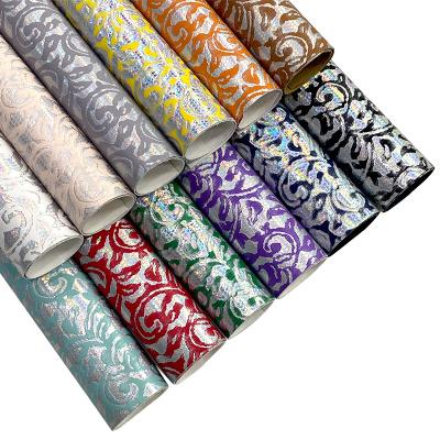 China Vintage Waterproof Iridescent Faux Leather Shiny Embossed Flower Pattern Synthetic Fabric For Upholstery Sewing Crafts DIY Project for sale