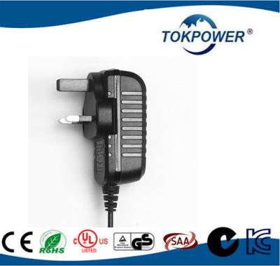 Cina multi spina BRITANNICA dell'alimentatore universale 12V 1A 12W della parete dell'adattatore di viaggio della spina 12W per il dispositivo elettrico in vendita