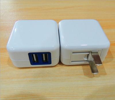 China Travel chager double USB white black charger folding foot mobile phone charger for sale