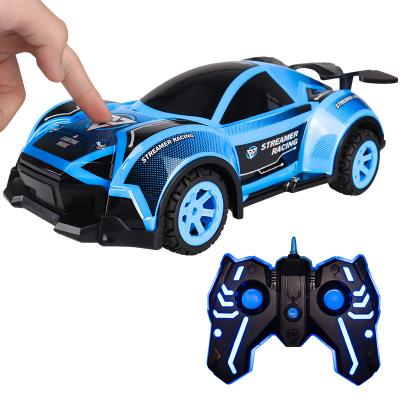 中国 Cheap Electric Drifting rc Car 2021 New Product Sales Toy Remote Control Toy Drift Spray Racing Cars with Light for kids 販売のため