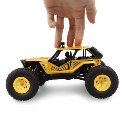 China remote cars for kid control electric climbing rc hand control car 1/20 4wd rock crawler vehicles toy Te koop