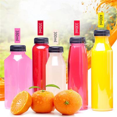 China 2018 Hot Selling Disposable Clear Juice Beverage PET Plastic Bottle With Lid for sale