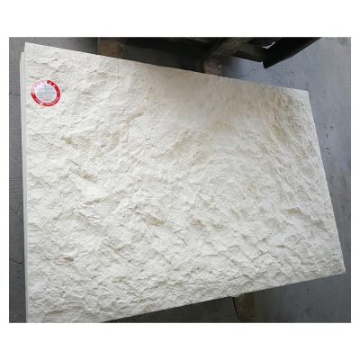 China Modern Split Face White Limestone Stacked Wall Stone Cladding for sale