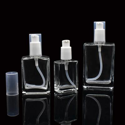 China High End Cosmetic Bottle 30ml 50ml 100ml Rectangle Glass Cosmetic Pump Bottle With Pump Top In Stock for sale