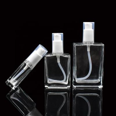 China 30ml 50ml 100ml Cosmetic Glass Bottle Cosmetic Rectangle Pump Glass Bottle For Lotion Serum Cosmetic In Stock for sale