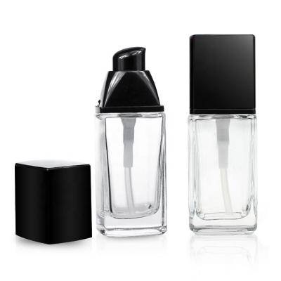 China 30ml Eco-friendly Cosmetic Glass Bottle With Pump Cap For Foundation Liquid Essence Cosmetic Packing In Stock for sale