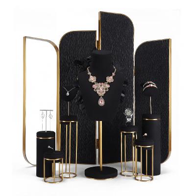 China Morden DIGU Wholesale Custom Jewelry Display Stand Set Gold Metal Ring Watch Stand Display Customize Jewelry Holder for sale