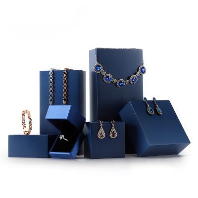 China OEM+ODM+Wholesale DIGU Wholesale Blue Jewelry Rack Display Showcase For Bracelet Necklace Rack Jewelry Display Earrings Display Stand for sale