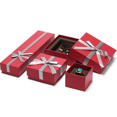 China DIGU Beautiful Fashionable Red Romantic Gift Jewelry Packaging Luxury Paper Jewelry Box With Ribbon for sale