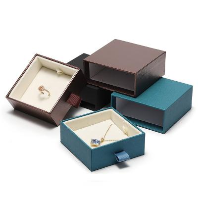 China DIGU Fashionable Custom Logo Printed Cardboard Jewelry Packaging Slip Gift Box Jewelry Drawer Hard Rigid Luxury Paper Box for sale