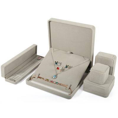 China Morden DIGU Custom Logo Jewelry Boxes Packaging Ring Bracelet Necklace Jewelry Storage Box Velvet Packaging Jewelry for sale