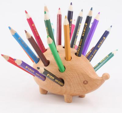 China Europe Nordic Hedgehog Solid Wood Carving Pen Container Ornaments for sale